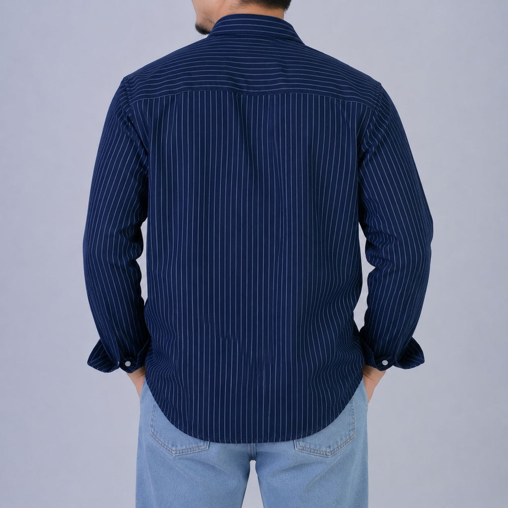 Rare boxy fit striped shirt featuring a classic design with bold horizontal stripes and a relaxed, casual fit.