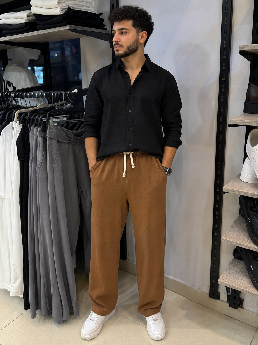 Rare linen pants, lightweight and breathable, shown in natural beige fabric with a relaxed fit and elastic waistband.