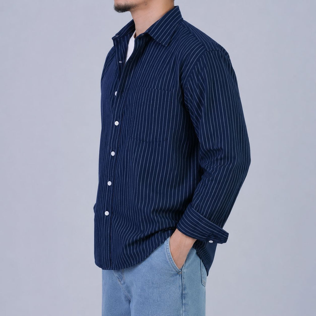 Rare boxy fit striped shirt featuring a classic design with bold horizontal stripes and a relaxed, comfortable fit.