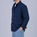 Rare boxy fit striped shirt featuring a classic design with bold horizontal stripes and a relaxed, comfortable fit.
