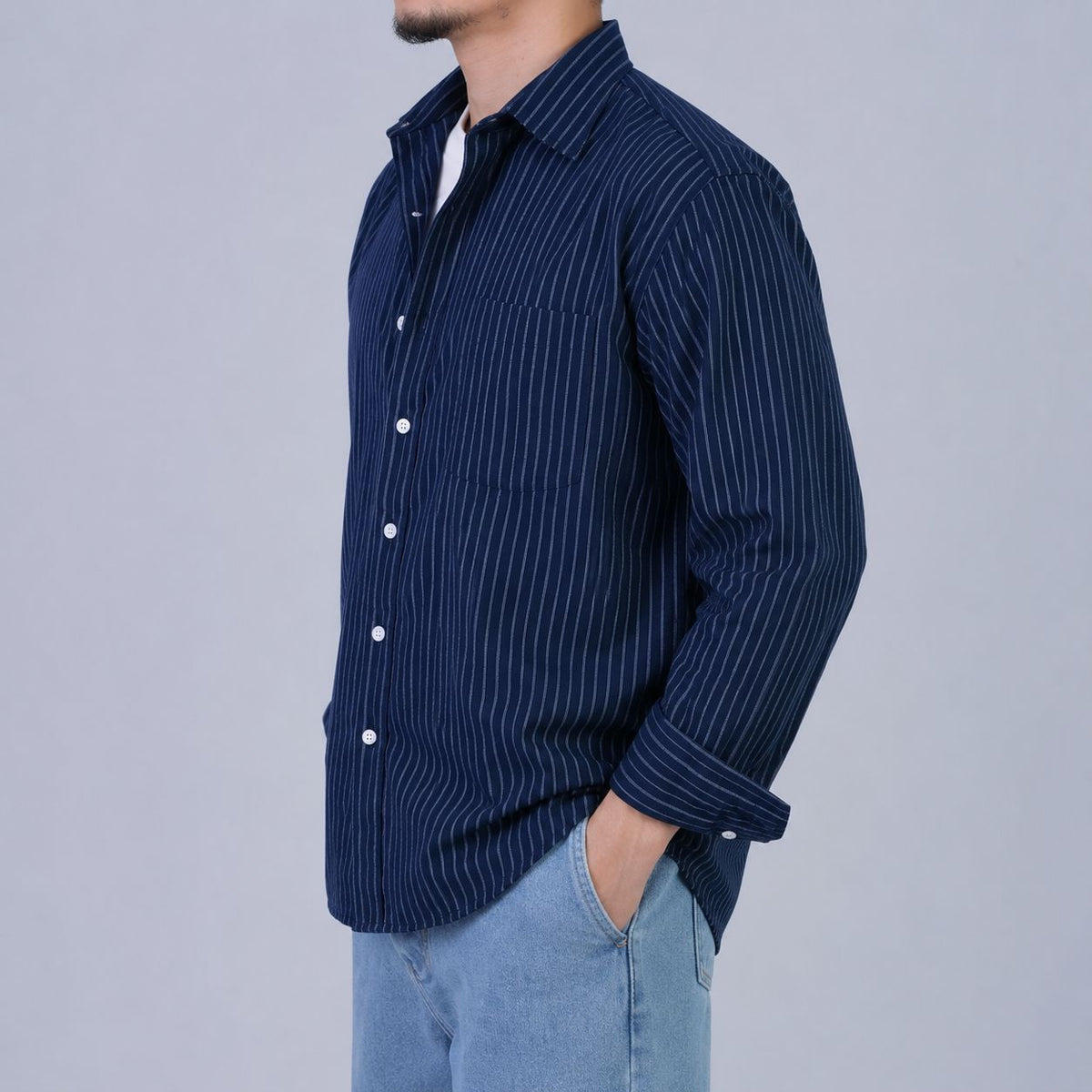 Rare boxy fit striped shirt featuring a classic design with bold horizontal stripes and a relaxed, comfortable fit.