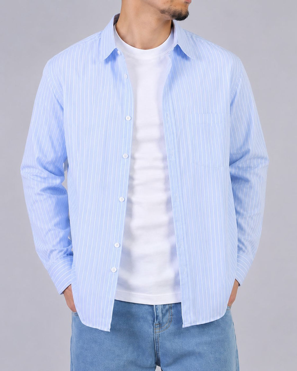 Rare boxy fit striped shirt featuring a classic pattern, long sleeves, and a relaxed silhouette, perfect for casual wear.