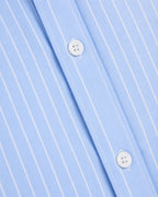 Rare boxy fit striped shirt with long sleeves and button front, featuring a casual, oversized style.