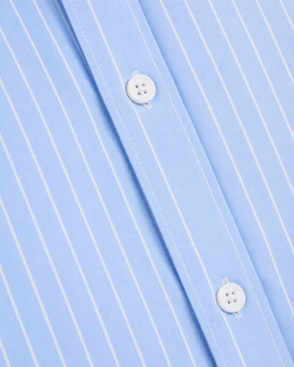 Rare boxy fit striped shirt with long sleeves and button front, featuring a casual, oversized style.