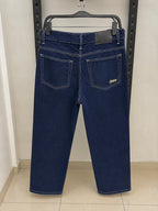 Rare STWD jeans showing classic blue denim with a slim fit, front pockets, and belt loops, laid flat on a white background.