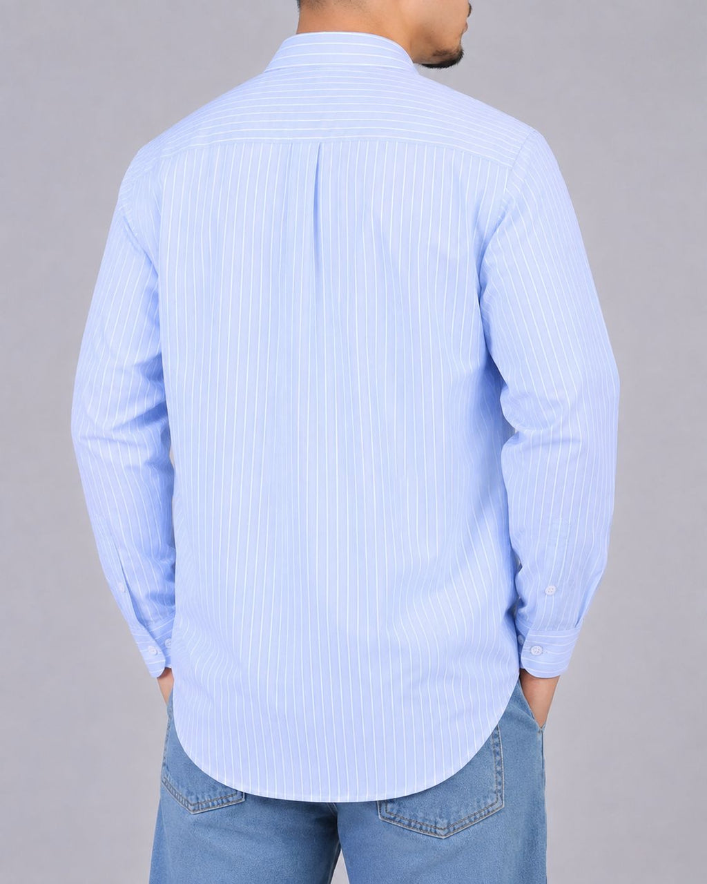 Rare boxy fit striped shirt with long sleeves, featuring a classic crew neckline and bold horizontal stripe pattern.