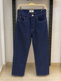 Rare STWD jeans showing slim fit design with classic denim fabric and five-pocket styling.