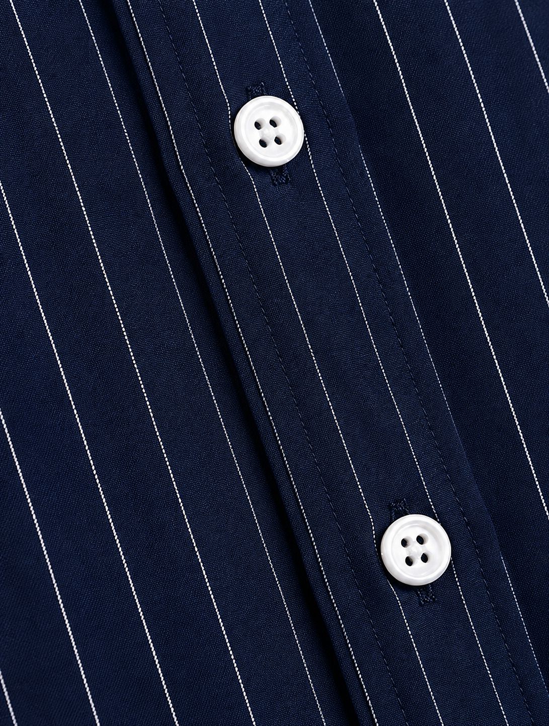 Rare boxy fit striped shirt with long sleeves and classic collar, displayed on a plain background.