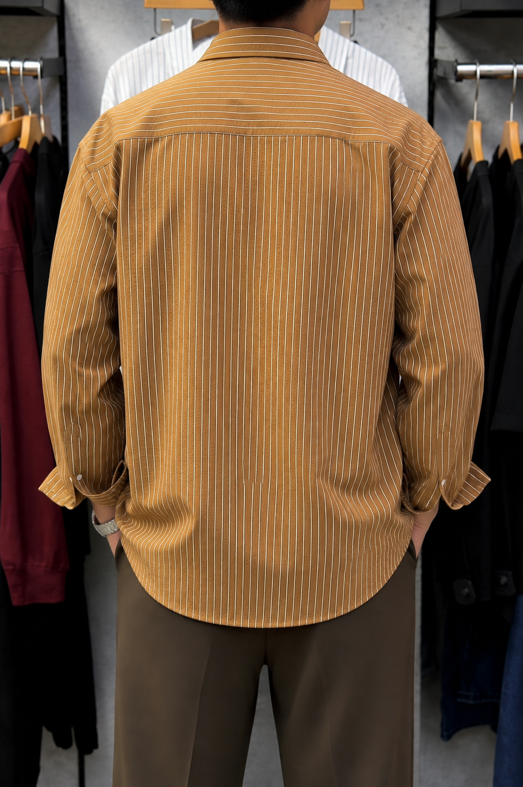 Rare boxy fit striped shirt with long sleeves and a classic collar, featuring a bold striped pattern.