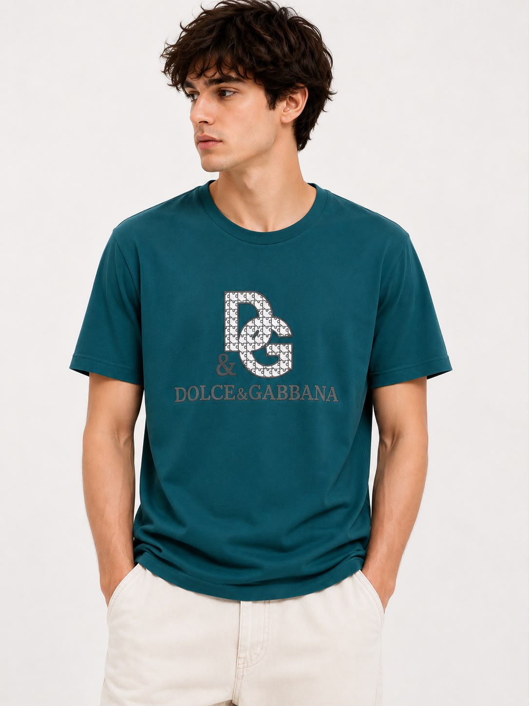 Rare D&G Monogram Graphic Crewneck T-Shirt in teal, featuring bold monogram print on soft cotton fabric.