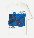 Bright blue graphic oversized tee by rare, featuring a bold white design, laid flat to showcase the relaxed fit and vibrant color.