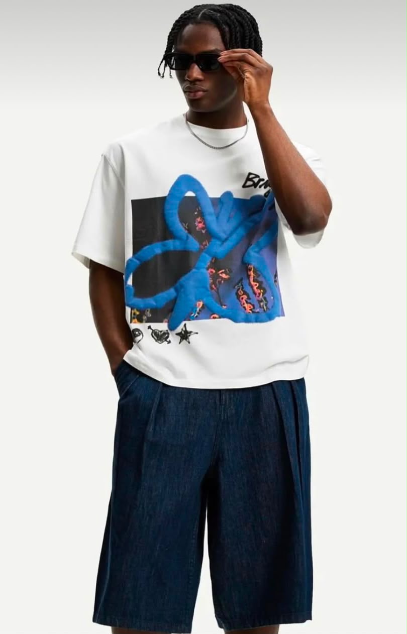 Rare bright blue graphic oversized T-shirt with white design, casual fit, and soft fabric visible in the image.