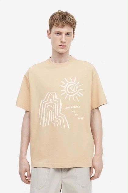 Light beige minimalist sun line art t-shirt by rare, featuring a simple sun design on soft cotton fabric.