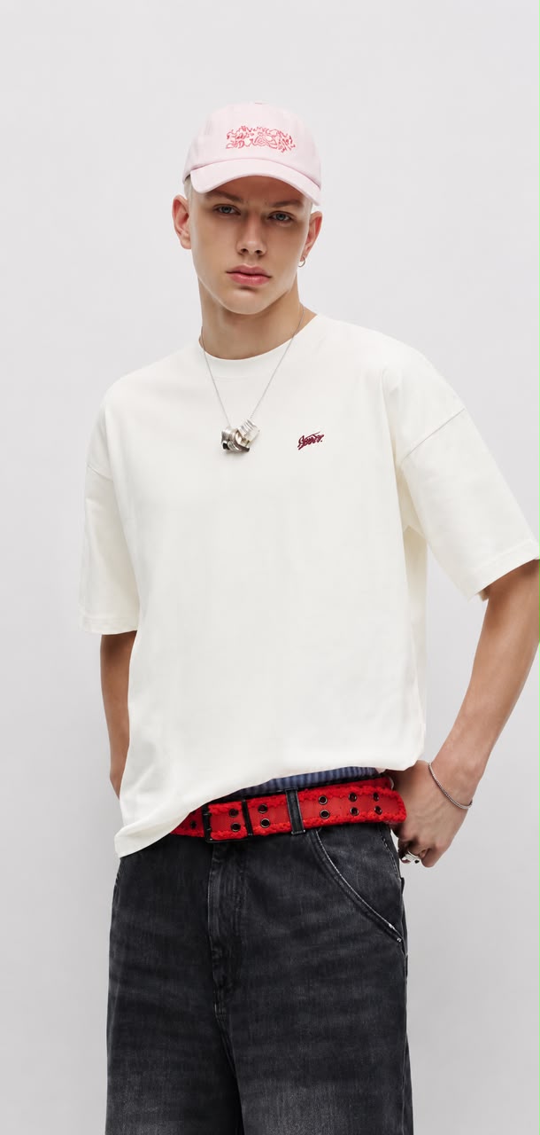 Rare Off-White "STWD" embroidered oversized T-shirt displayed flat, showing the front design and bold embroidered logo.