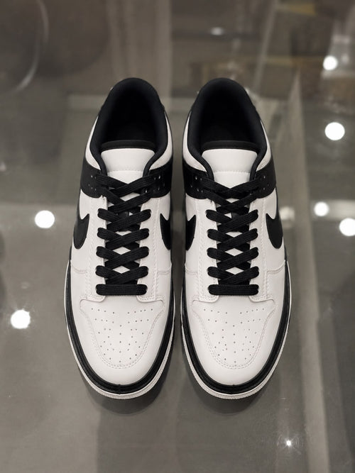 Rare Nike SB Mirror sneaker with reflective silver upper, showcasing its stylish design and textured sole in a close-up shot.