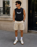 Rare sleeveless muscle tank top displayed on a model, showcasing its fit and style for athletic and casual wear.