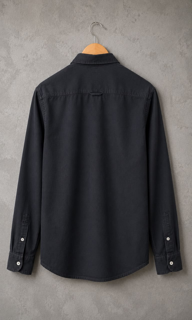 Rare linen shirt displayed on a hanger, showcasing its lightweight, breathable fabric and classic button-up design.