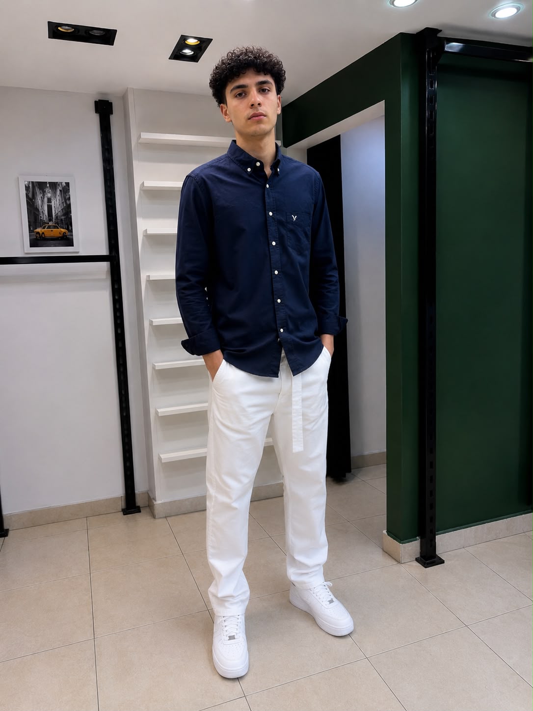Rare American Eagle shirt displayed on a hanger, featuring a casual fit with a classic design in a neutral color.