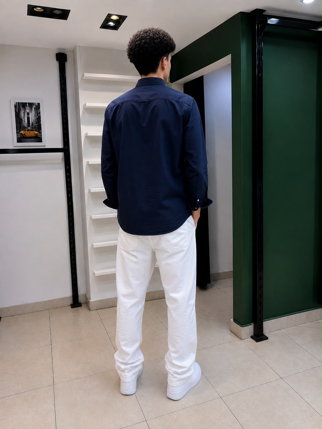 Rare American Eagle shirt displayed on a hanger, featuring casual fit with classic design and soft fabric in a vibrant color.