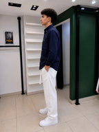 Rare American Eagle shirt displayed on a hanger with a casual fit and classic design in a well-lit setting.