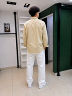 Rare American Eagle shirt displayed on a hanger with a casual fit and classic design, featuring a soft, comfortable fabric.