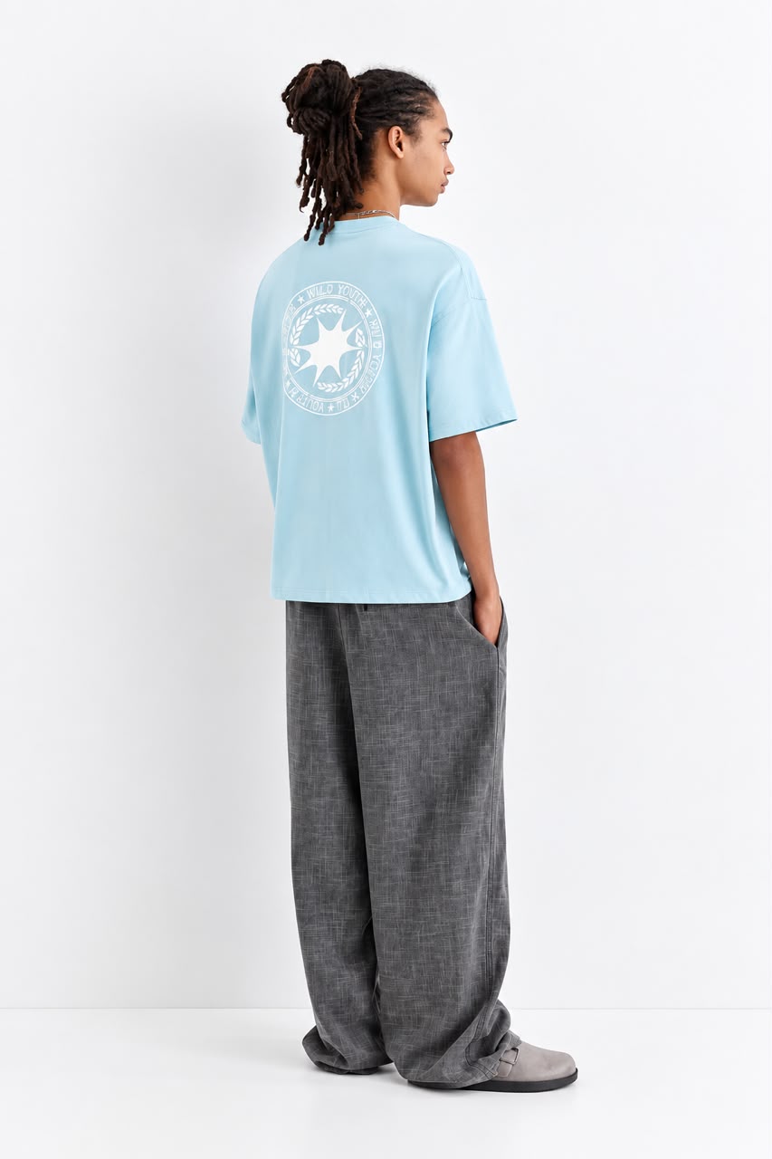 Rare Wild Youth P&B T-shirt featuring bold graphic print and comfortable cotton fabric, displayed on a hanger.